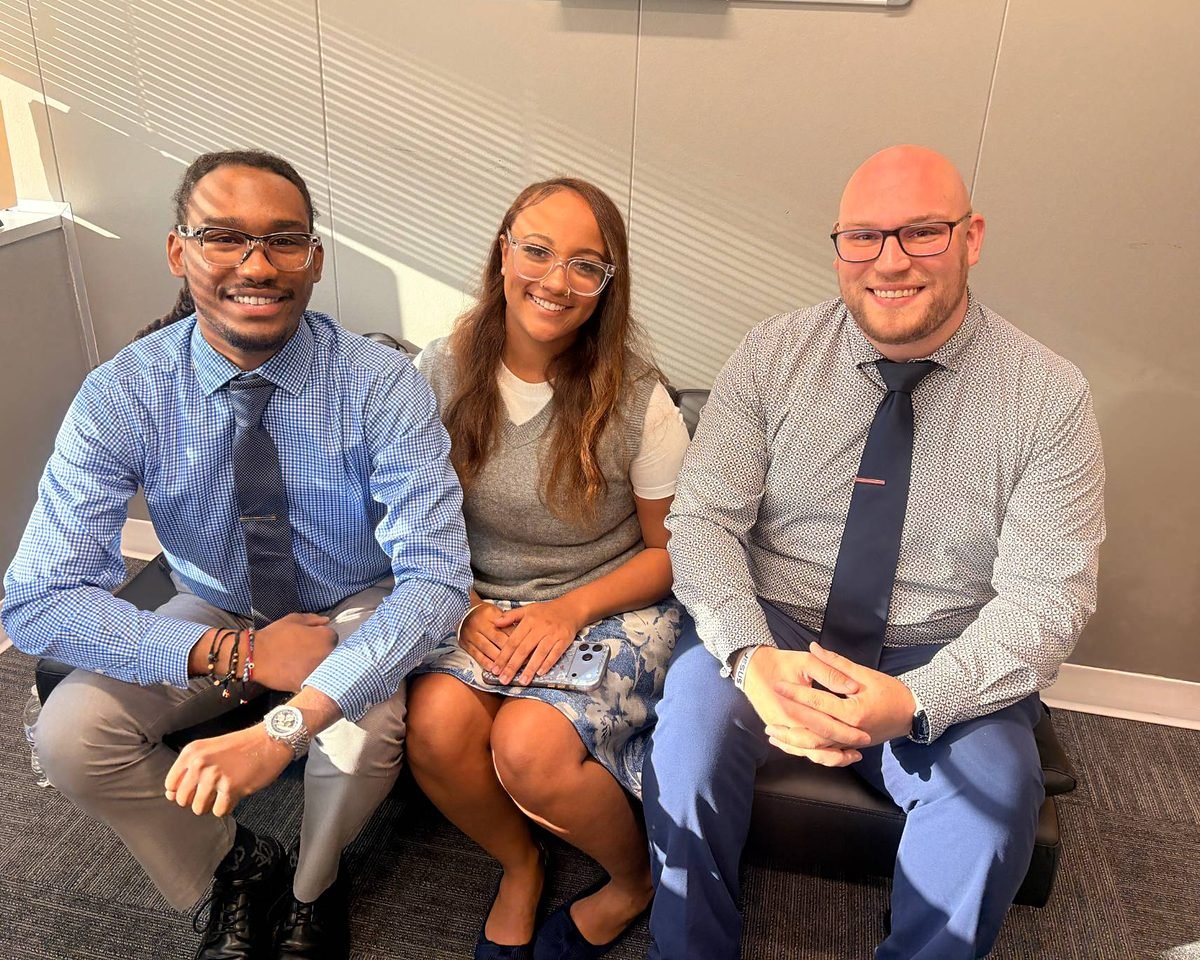 Three members of the Kaeden & Co. team in the office